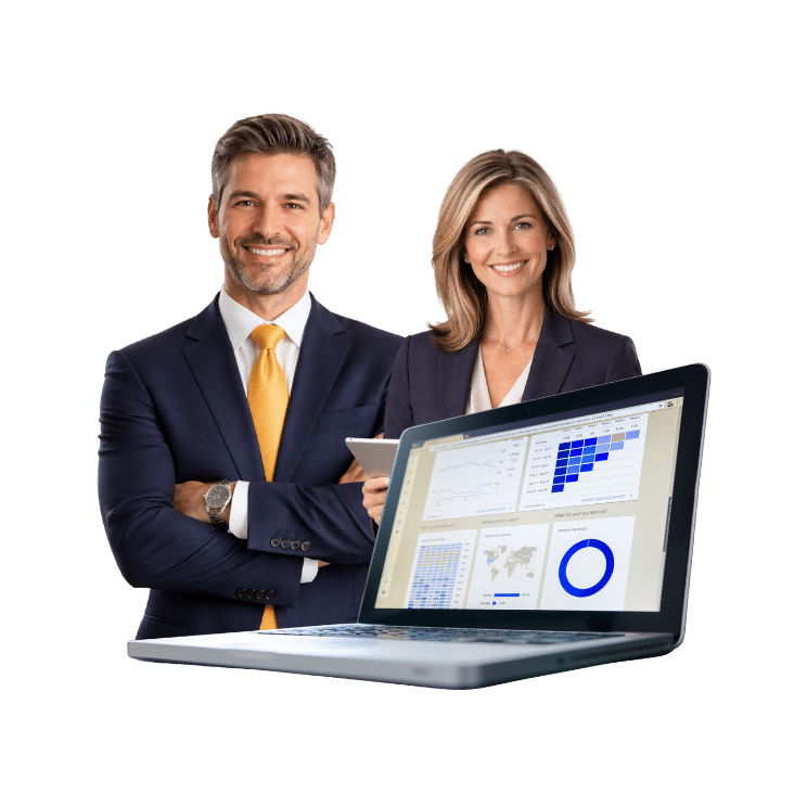 Two business professionals stand behind a laptop showing sales analytics dashboards.